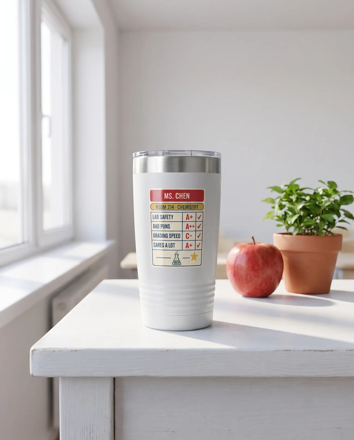 Teacher Report Card, Chemistry badge on a white 20oz tumbler personalized MS. CHEN, ROOM 214 - CHEMISTRY, a white-painted teacher's desk by a sunny classroom window