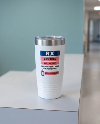 Rx Label, NICU Nurse badge on a white 20oz tumbler personalized NURSE AMARA, NICU - DAY SHIFT, a clean hospital nurses' station counter