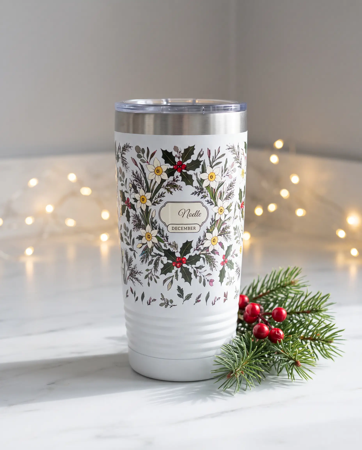 December Birth Flowers wrap on a white 20oz tumbler personalized Noelle, a cozy kitchen counter at Christmas