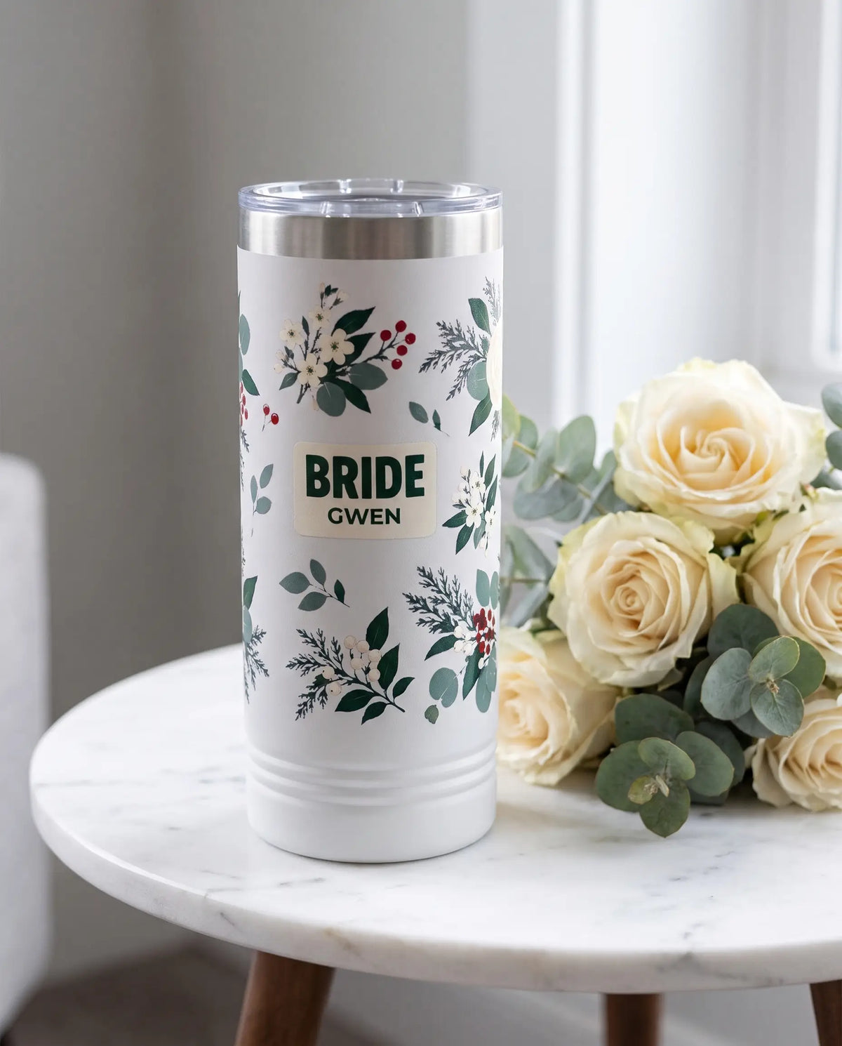 Winter Greenery Bride Skinny on a white 22oz skinny tumbler, UV printed by Karved