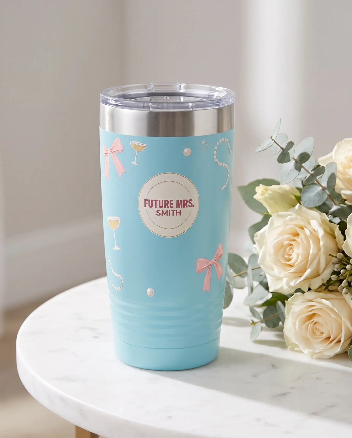 Pearls and Bows Future Mrs on a light blue 20oz Ringneck tumbler, UV printed by Karved