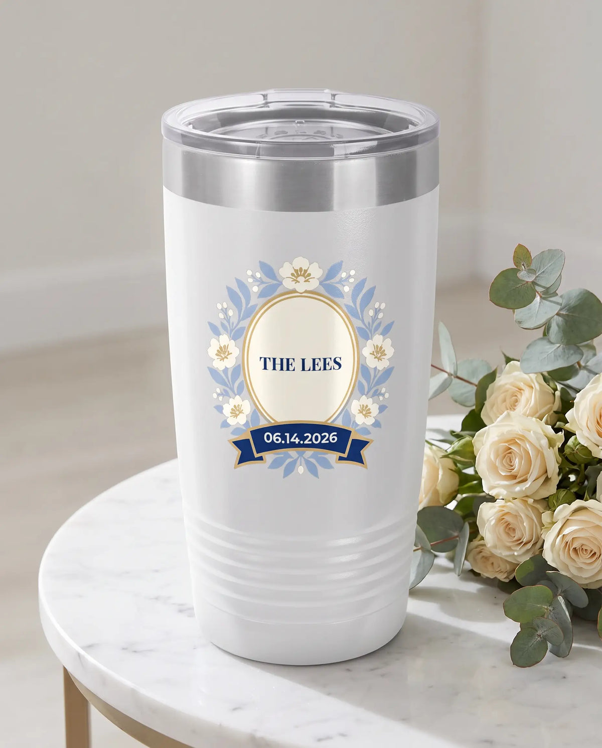 Frost Florals Navy Ribbon on a white 20oz Ringneck tumbler, UV printed by Karved