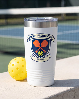 Sunset Paddle Club Crest on a white 20oz Ringneck tumbler, UV printed by Karved
