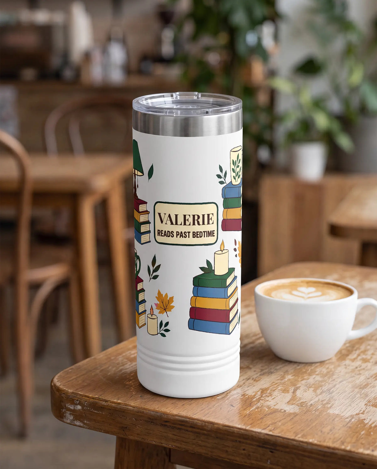 Reads Past Bedtime Skinny on a white 22oz skinny tumbler, UV printed by Karved
