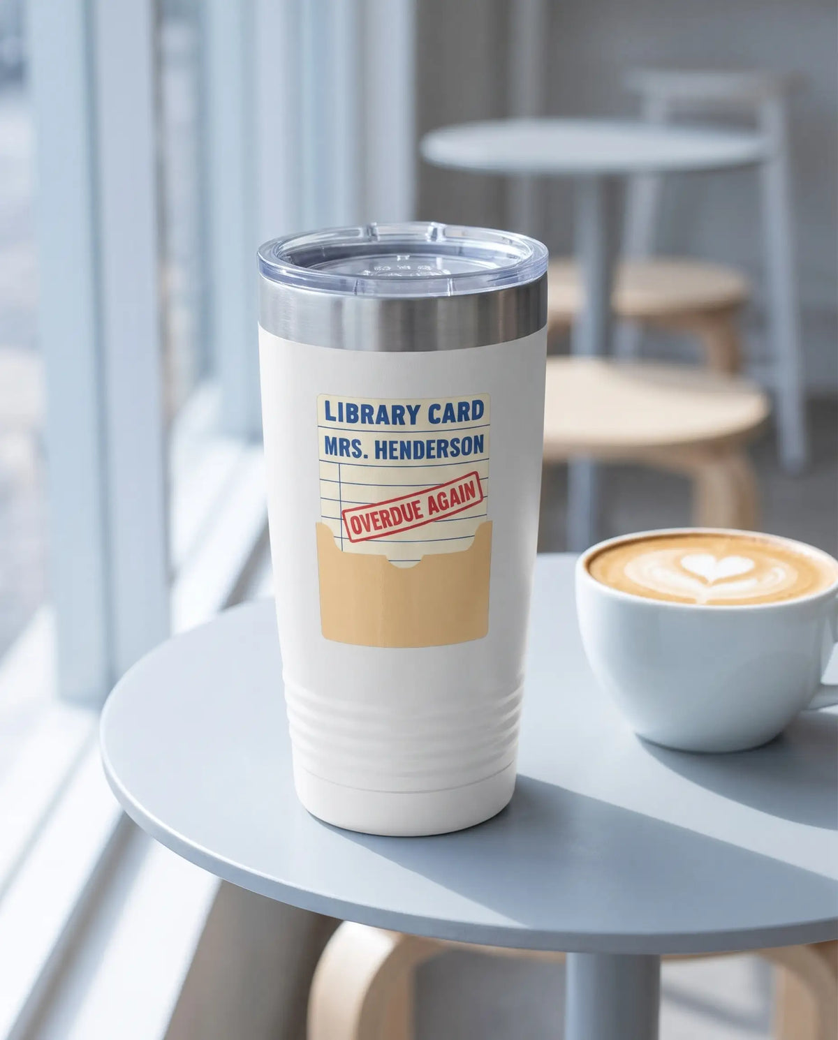 Overdue Again Library Card on a white 20oz Ringneck tumbler, UV printed by Karved