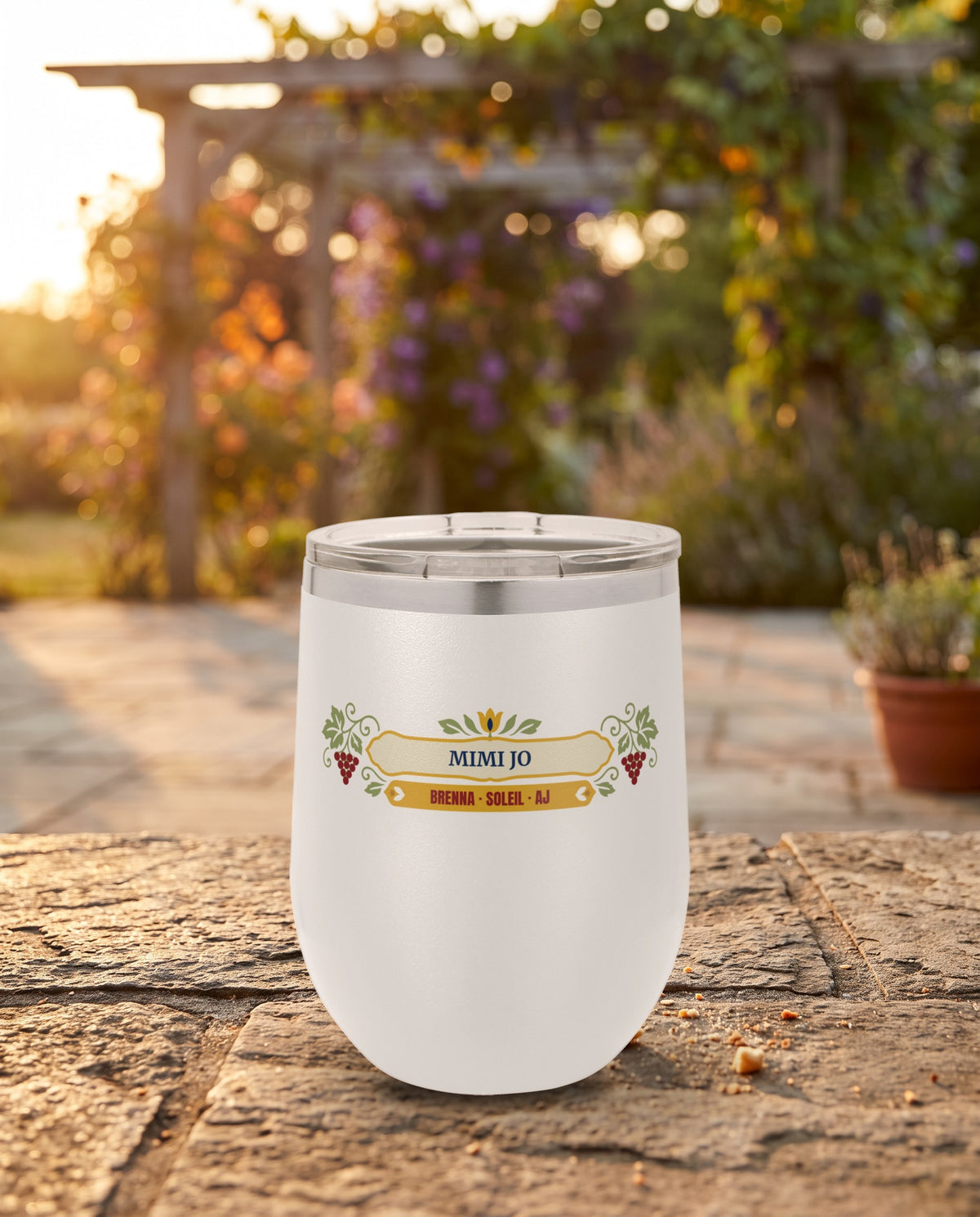 Folk Grapevine, a folk grapevine in red, sage, gold and cream, UV printed on the front of a 12oz stemless wine tumbler in White, sample name MIMI JO
