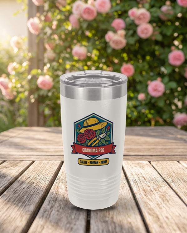 Rose Garden Badge, a rose garden badge in teal, red, gold, green and navy, UV printed on the front of a 20oz Ringneck tumbler in White, sample name GRANDMA PEG