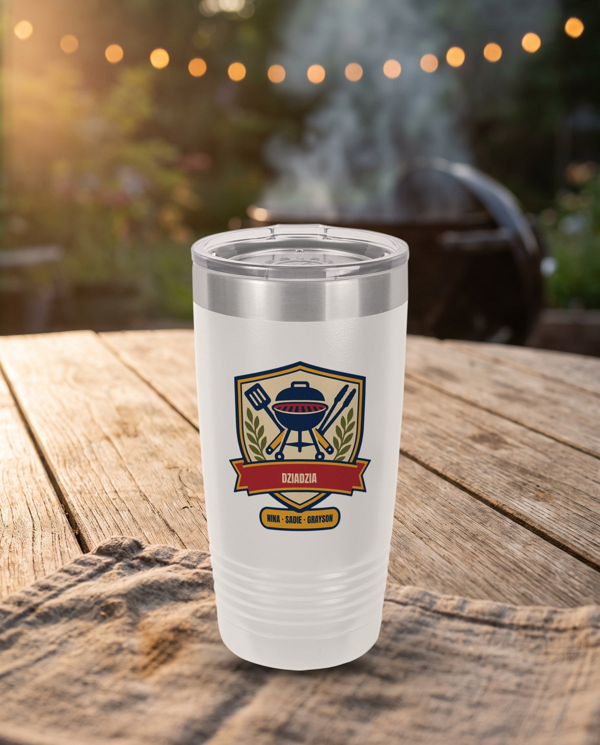 Backyard Grill Badge, a grill badge in navy, red, gold, cream and olive, UV printed on the front of a 20oz Ringneck tumbler in White, sample name DZIADZIA