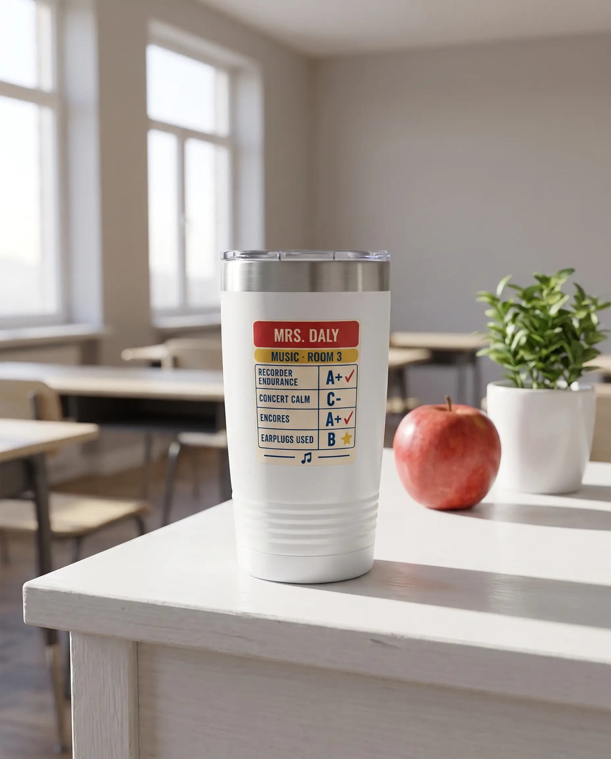 Teacher Report Card, Music badge on a white 20oz tumbler personalized MRS. DALY, MUSIC - ROOM 3, a white-painted teacher's desk by a sunny classroom window