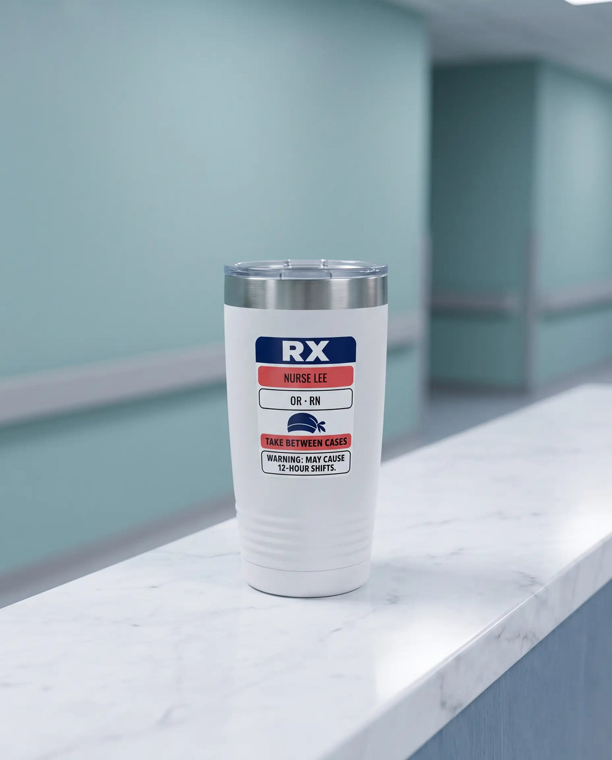 Rx Label, OR Nurse badge on a white 20oz tumbler personalized NURSE LEE, OR - RN, a clean hospital nurses' station counter