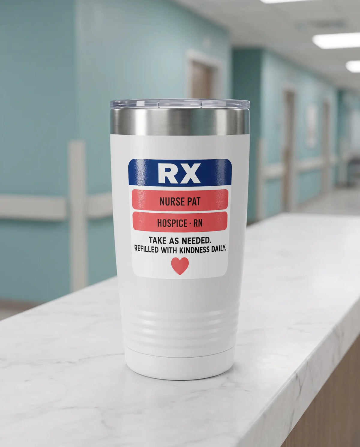 Rx Label, Hospice Nurse badge on a white 20oz tumbler personalized NURSE PAT, HOSPICE - RN, a clean hospital nurses' station counter