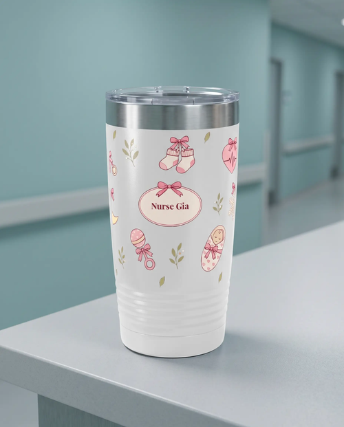 Bow Toss, L&D Nurse wrap on a white 20oz tumbler personalized Nurse Gia, a clean hospital nurses' station counter