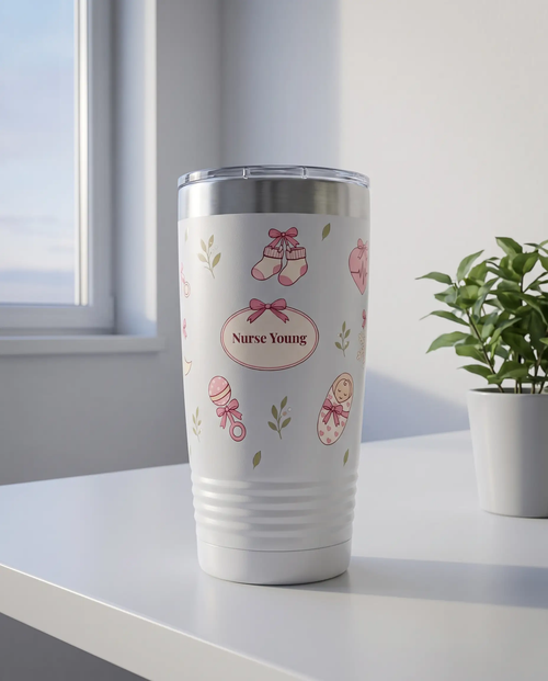 Bow Toss, L&D Nurse wrap on a white 20oz tumbler personalized Nurse Young, three-quarter view showing the ribbed lower wall, a white hospital break-room table by a window at dawn
