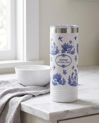 Garden Toile wrap on a white 22oz Skinny tumbler personalized MOTHER, OF NORA - TESS, a farmhouse kitchen counter of white marble