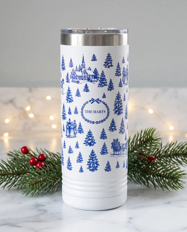 Christmas Toile wrap on a white 22oz Skinny tumbler personalized THE HARTS, a cozy kitchen counter at Christmas