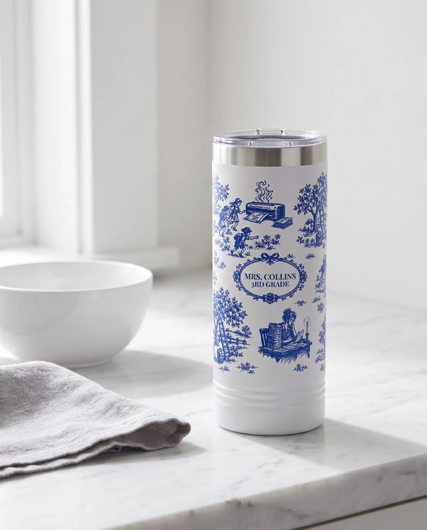 Teacher Life Toile wrap on a white 22oz Skinny tumbler personalized MRS. COLLINS, 3RD GRADE, a farmhouse kitchen counter of white marble