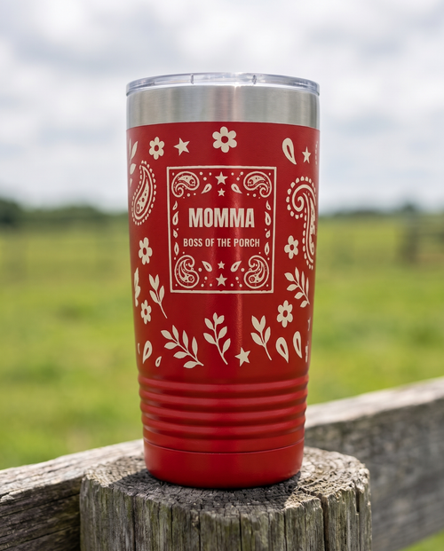Bandana Paisley, Boss of the Porch wrap on a red 20oz tumbler personalized MOMMA, BOSS OF THE PORCH, a weathered fence post at a ranch