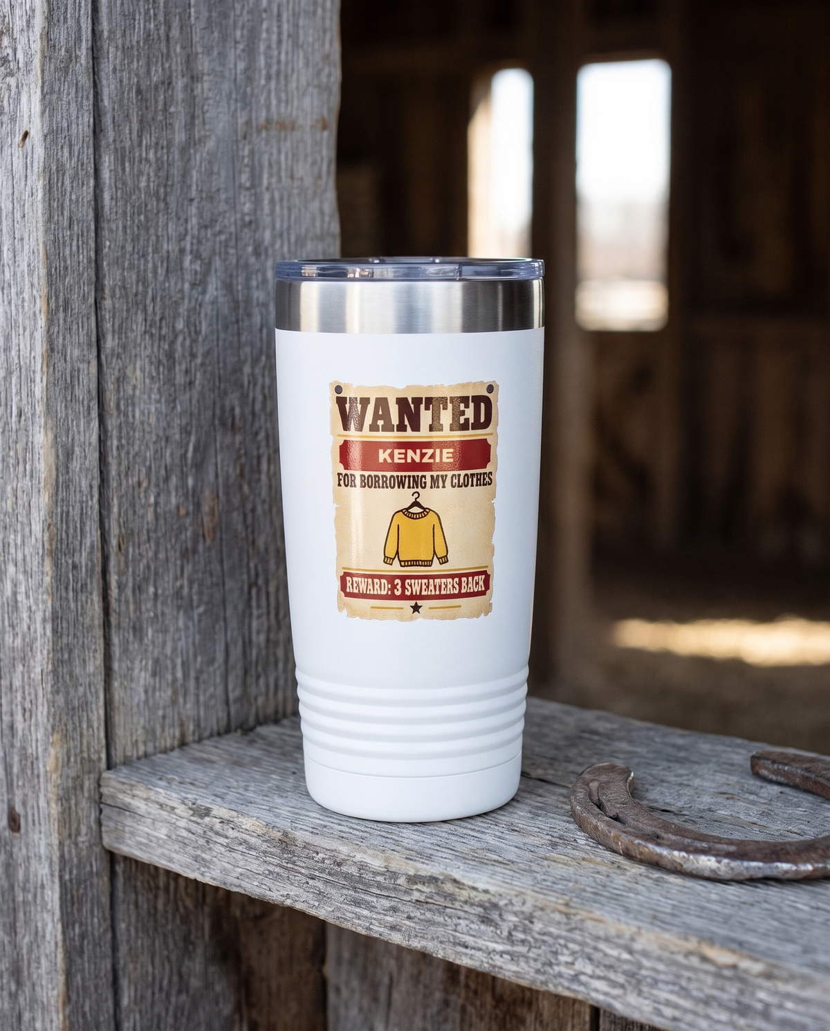 Wanted Poster, Borrowing My Clothes badge on a white 20oz tumbler personalized KENZIE, a weathered barnwood shelf in a rustic barn