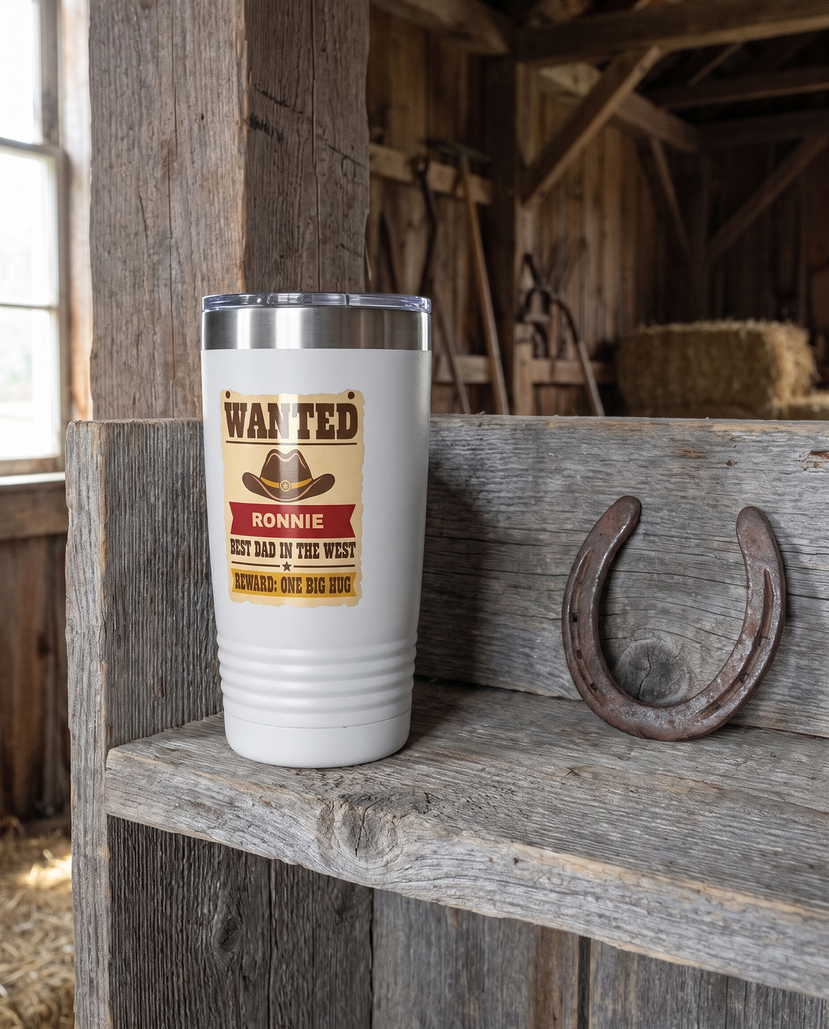 Wanted Poster, Best Dad in the West badge on a white 20oz tumbler personalized RONNIE, a weathered barnwood shelf in a rustic barn