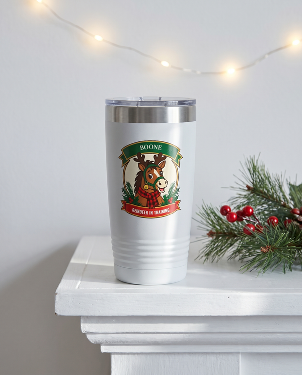 Cowboy Christmas, Reindeer in Training badge on a white 20oz tumbler personalized BOONE, REINDEER IN TRAINING, a white-painted ranch-house mantel at Christmas