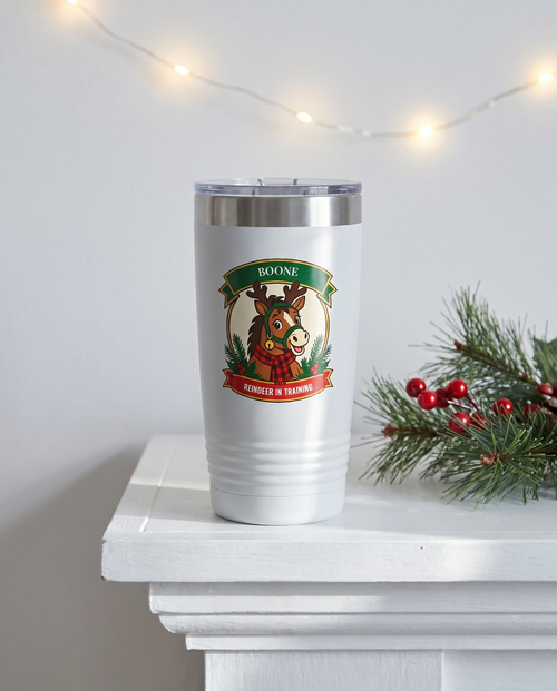 Cowboy Christmas, Reindeer in Training badge on a white 20oz tumbler personalized BOONE, REINDEER IN TRAINING, a white-painted ranch-house mantel at Christmas