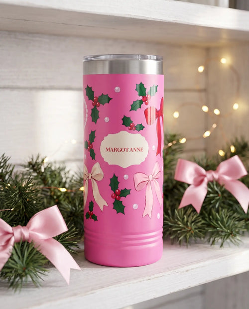 Bows and Holly Skinny on a pink 22oz skinny tumbler, UV printed by Karved