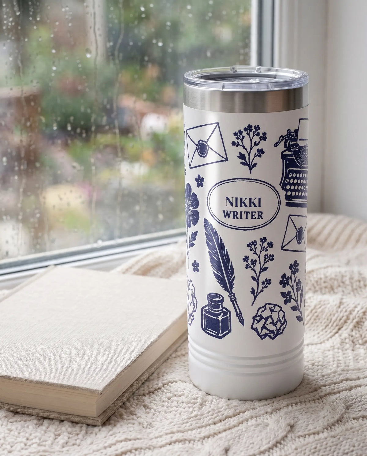 Writer Florals Skinny on a white 22oz skinny tumbler, UV printed by Karved