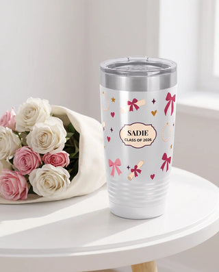 Senior Bows 2026 on a white 20oz Ringneck tumbler, UV printed by Karved