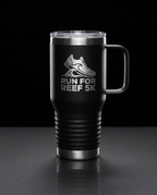 20oz Travel Mug with a custom laser-engraved logo, studio photo on a dark background | Karved Concepts