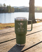20oz Travel Mug with a custom laser-engraved logo, outdoors | Karved Concepts