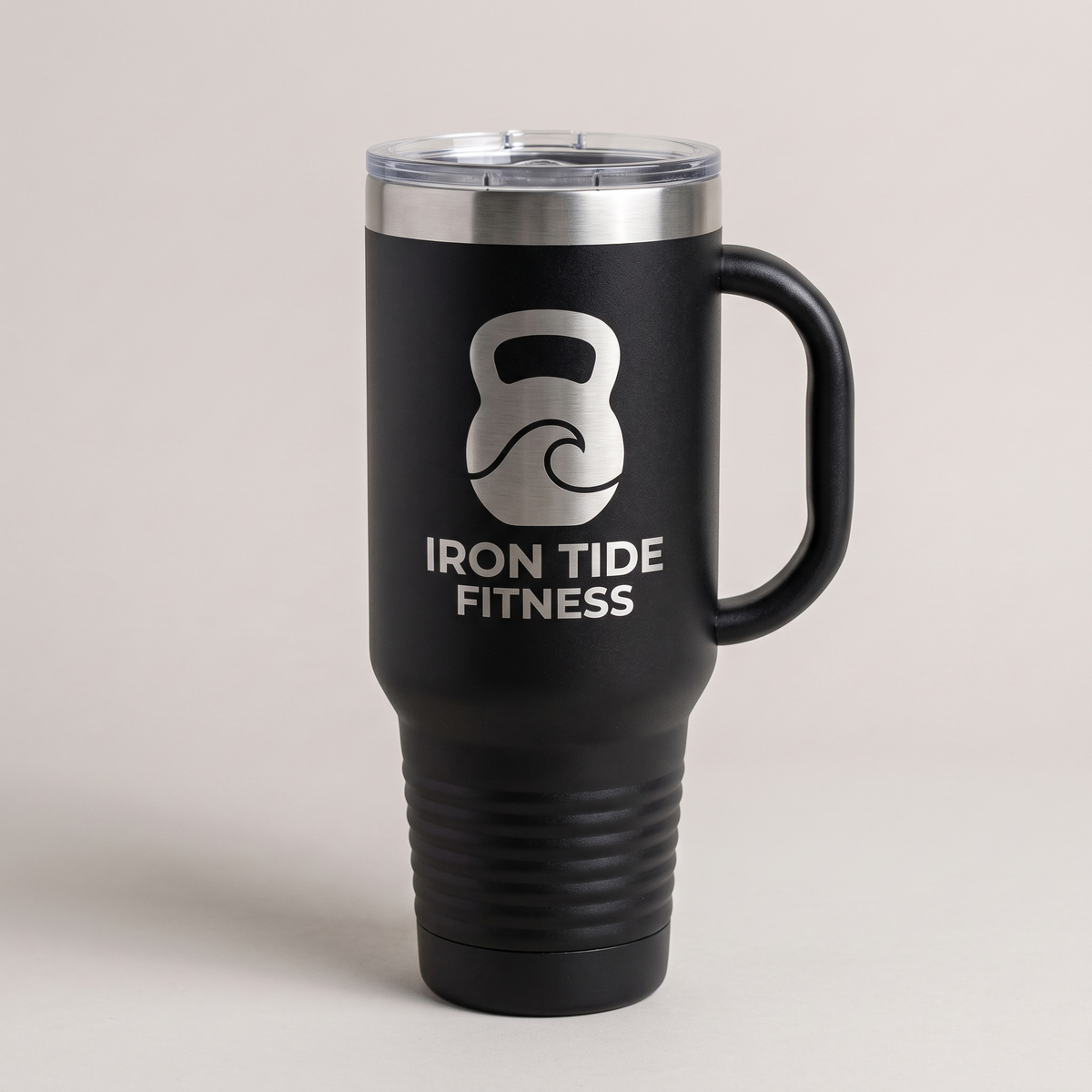 40oz Travel Mug with a custom laser-engraved logo, studio photo | Karved Concepts