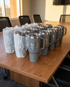 40oz Travel Mug with a custom laser-engraved logo, bulk corporate order | Karved Concepts