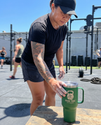 40oz Travel Mug with a custom laser-engraved logo, lifestyle photo 1 | Karved Concepts