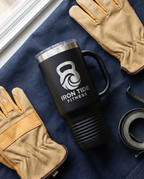 40oz Travel Mug with a custom laser-engraved logo, flat lay | Karved Concepts