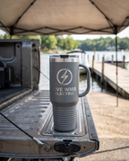 40oz Travel Mug with a custom laser-engraved logo, outdoors | Karved Concepts
