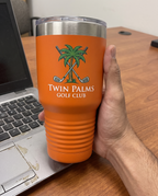 30oz Ringneck Tumbler, UV printed with a sample business logo (illustrative image, in hand for scale)