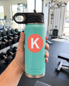 20oz Water Bottle, held in hand to show its size | Karved Concepts