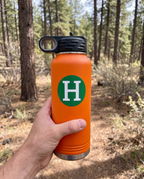 32oz Water Bottle, held in hand to show its size | Karved Concepts
