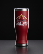 20oz Pilsner Tumbler with a custom full-color printed logo, studio photo on a dark background | Karved Concepts